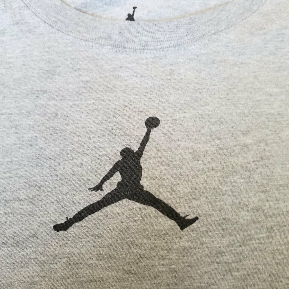Nike Air Jordan heather gray tee with a small jump